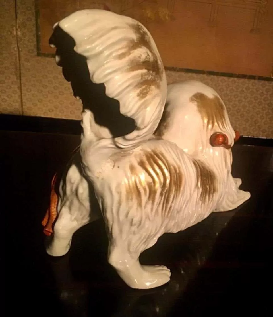 Japanese Kutani Porcelain Pekinese Dog Playing with Shinto Shrine Bell