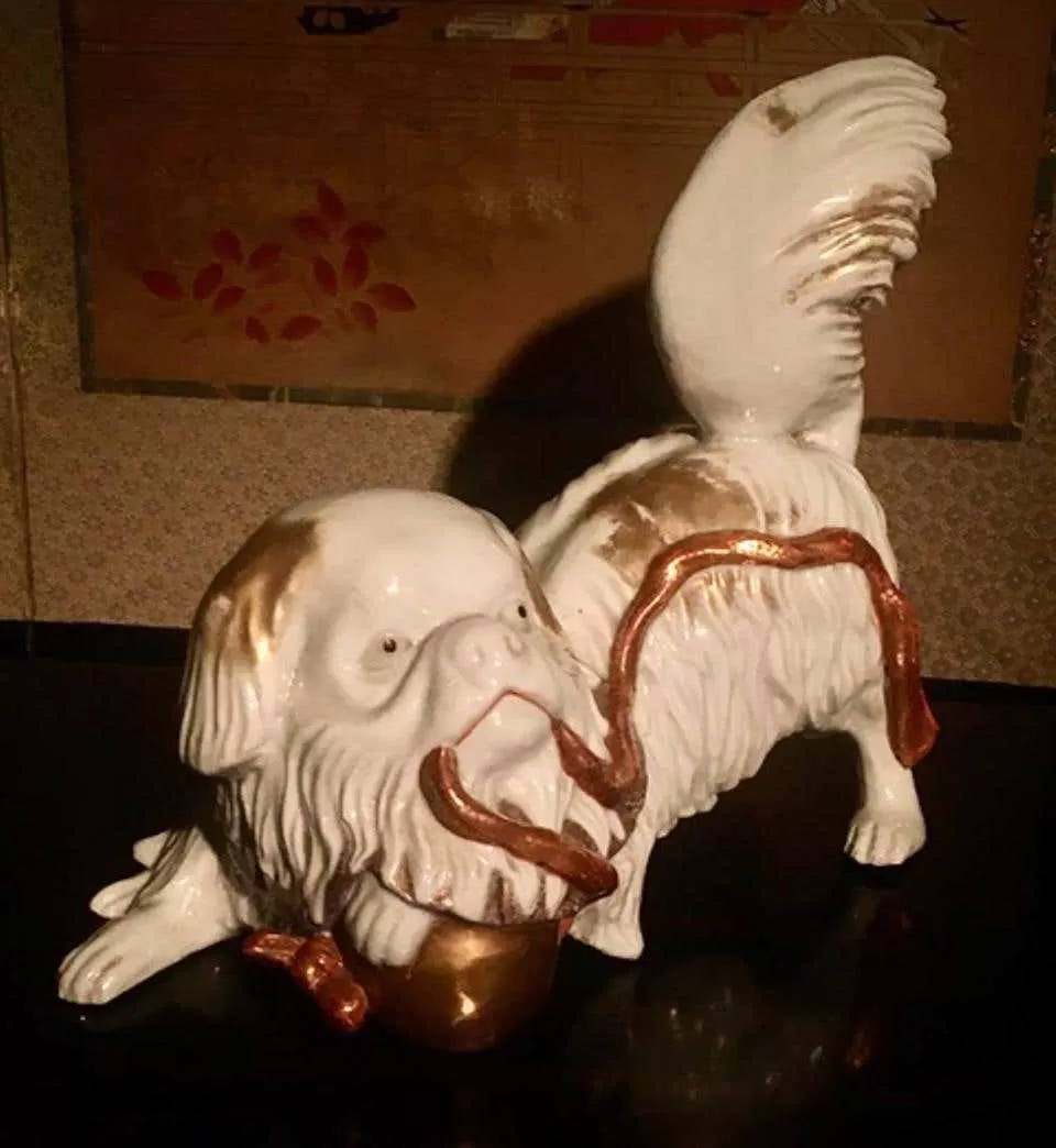 Japanese Kutani Porcelain Pekinese Dog Playing with Shinto Shrine Bell